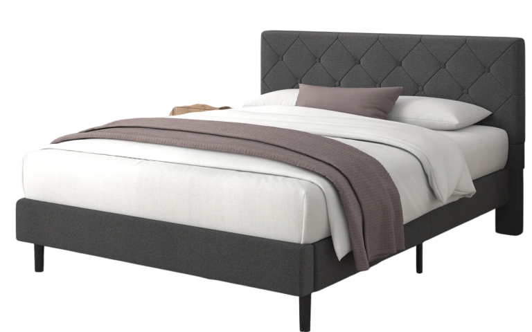 A stylish grey upholstered bed with a tufted headboard and sturdy slat. A stylish grey upholstered bed with a tufted headboard and sturdy slat.